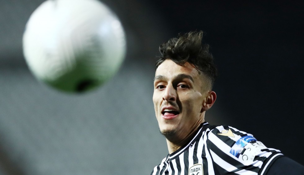 A generic square placeholder image with rounded corners in a figure.