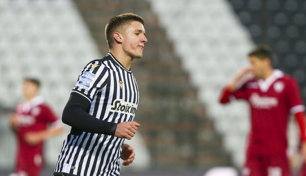 A generic square placeholder image with rounded corners in a figure.