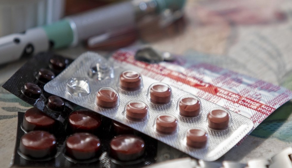 A generic square placeholder image with rounded corners in a figure.