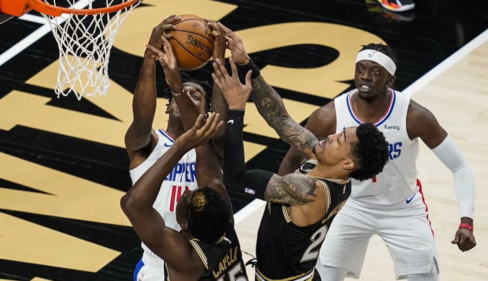 A generic square placeholder image with rounded corners in a figure.