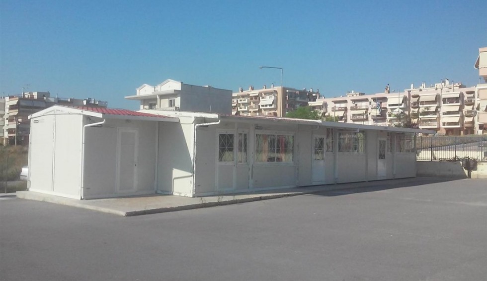 A generic square placeholder image with rounded corners in a figure.