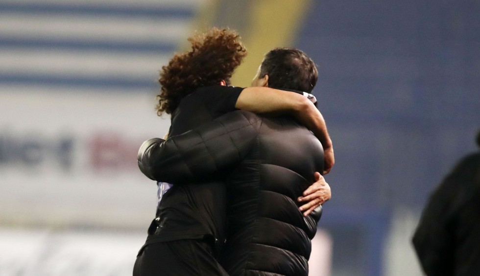 A generic square placeholder image with rounded corners in a figure.