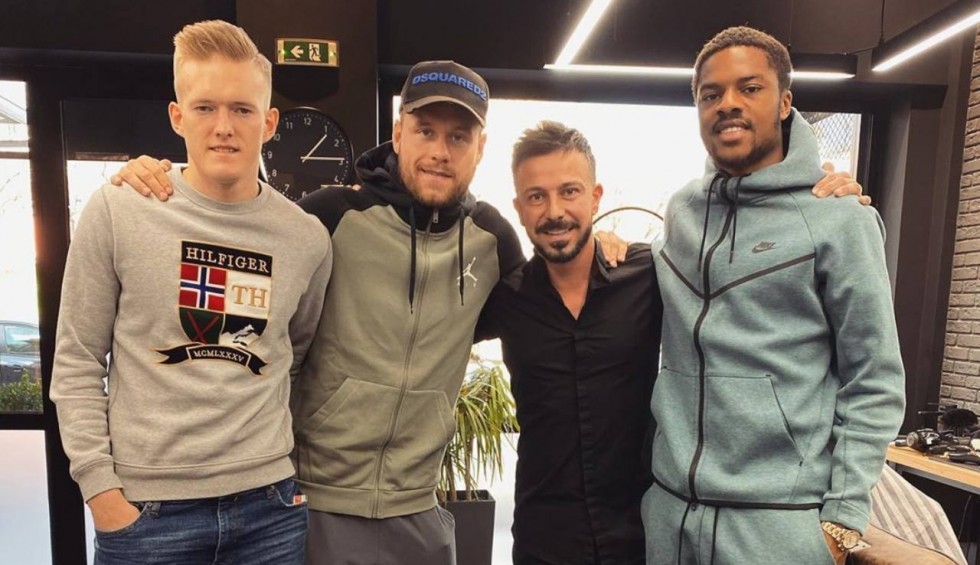 A generic square placeholder image with rounded corners in a figure.