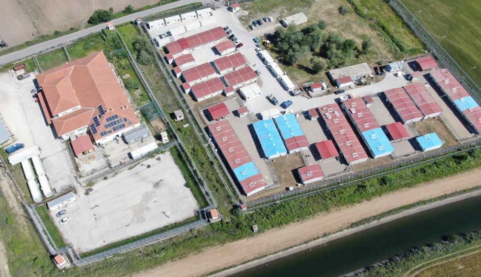 A generic square placeholder image with rounded corners in a figure.