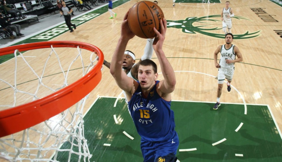 A generic square placeholder image with rounded corners in a figure.