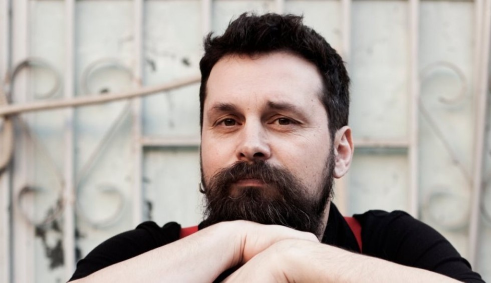 A generic square placeholder image with rounded corners in a figure.