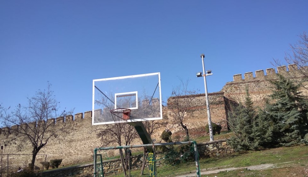 A generic square placeholder image with rounded corners in a figure.