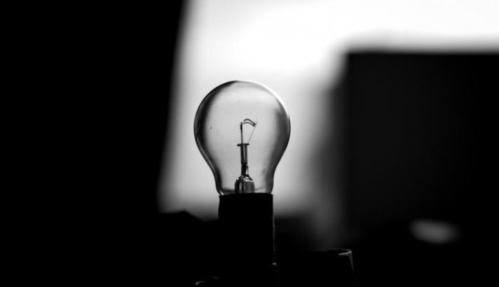 A generic square placeholder image with rounded corners in a figure.