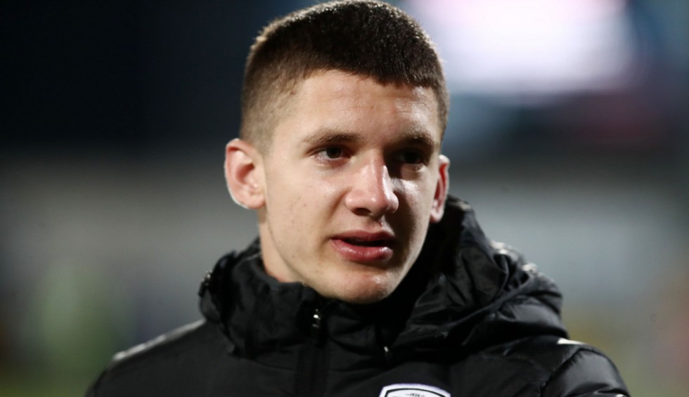 A generic square placeholder image with rounded corners in a figure.