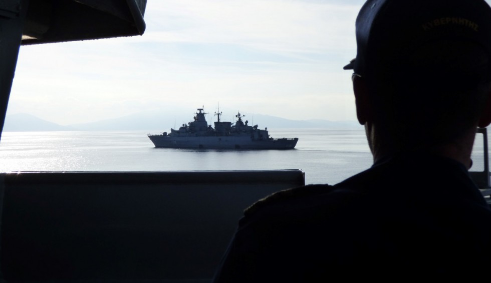 A generic square placeholder image with rounded corners in a figure.