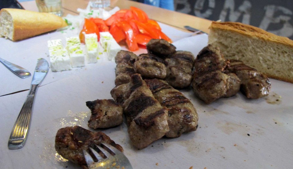 A generic square placeholder image with rounded corners in a figure.