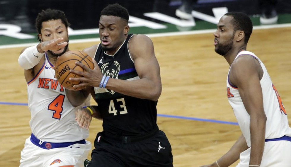 A generic square placeholder image with rounded corners in a figure.