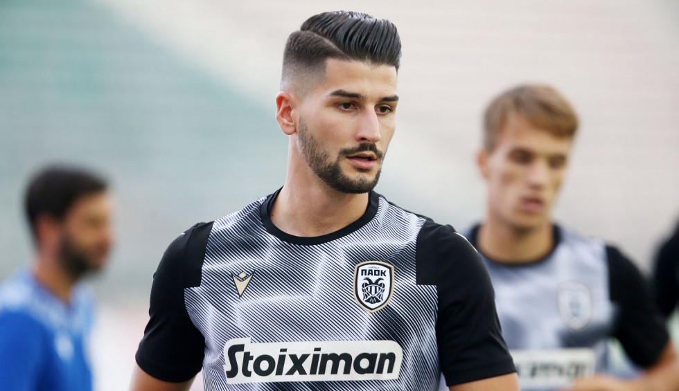 A generic square placeholder image with rounded corners in a figure.