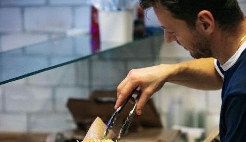 A generic square placeholder image with rounded corners in a figure.