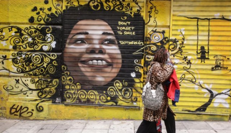 A generic square placeholder image with rounded corners in a figure.