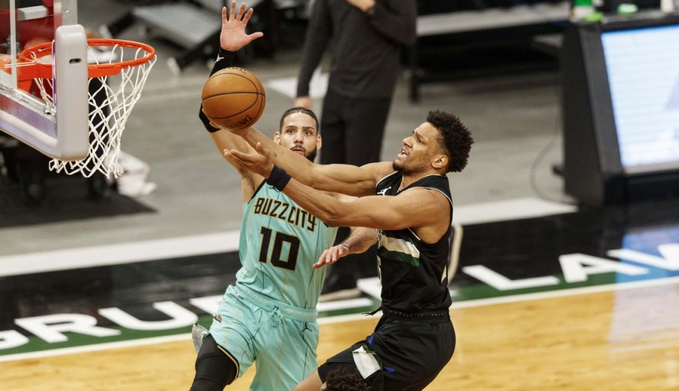 A generic square placeholder image with rounded corners in a figure.