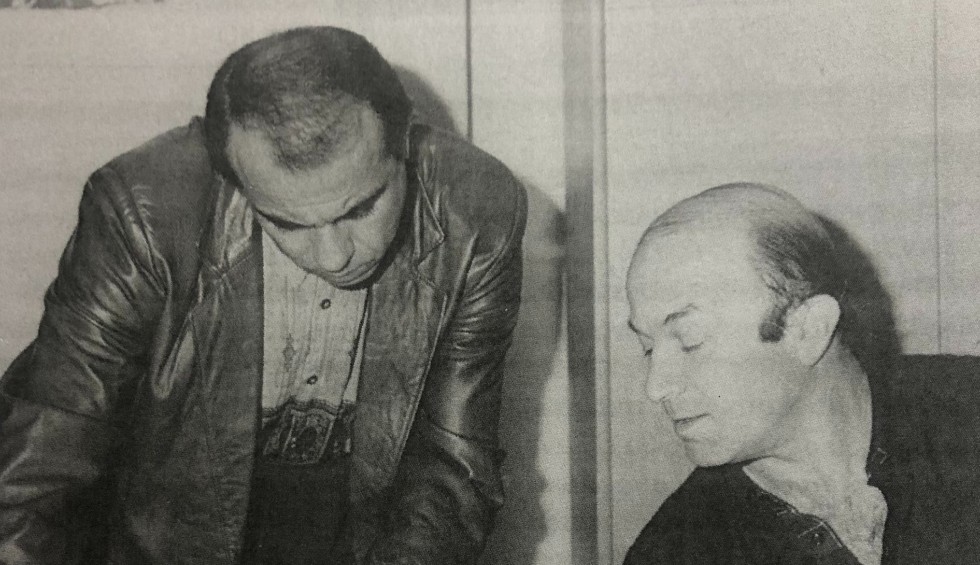 A generic square placeholder image with rounded corners in a figure.