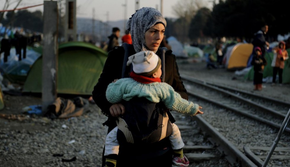 A generic square placeholder image with rounded corners in a figure.