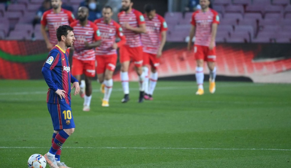 A generic square placeholder image with rounded corners in a figure.