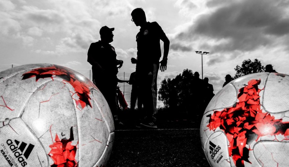 A generic square placeholder image with rounded corners in a figure.