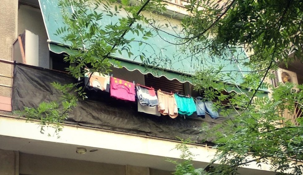 A generic square placeholder image with rounded corners in a figure.