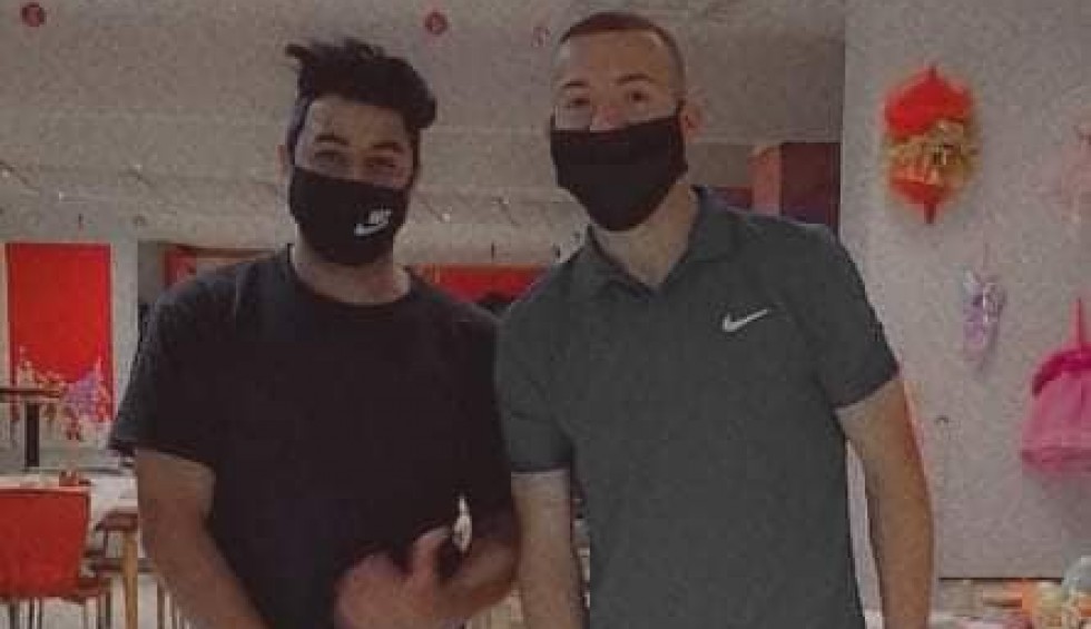 A generic square placeholder image with rounded corners in a figure.