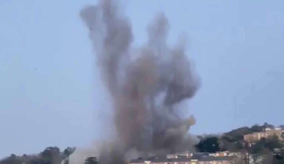 A generic square placeholder image with rounded corners in a figure.