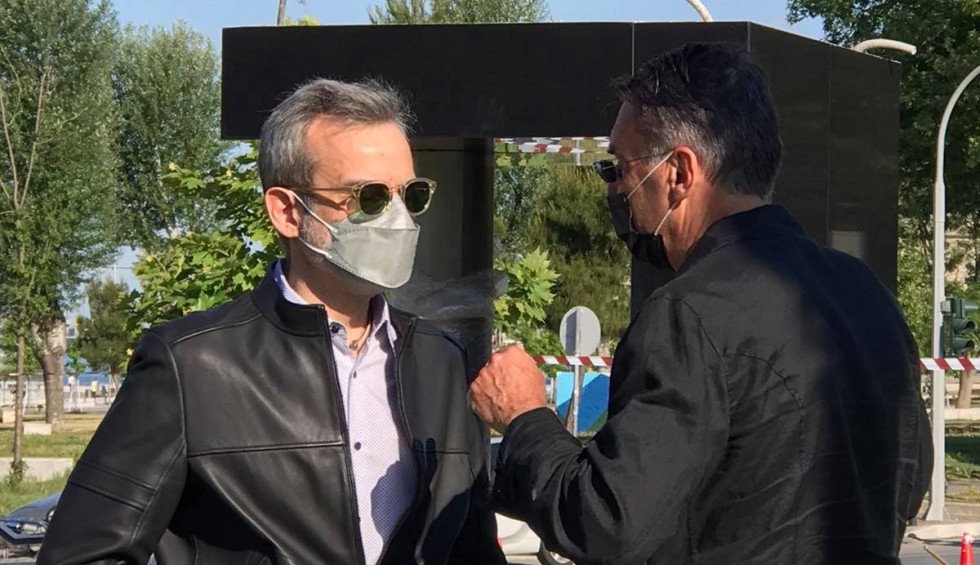 A generic square placeholder image with rounded corners in a figure.