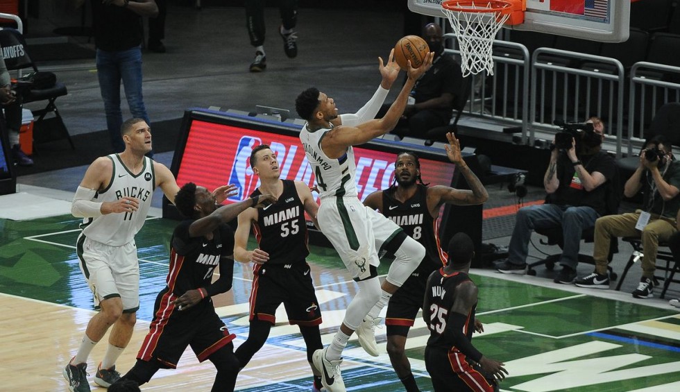 A generic square placeholder image with rounded corners in a figure.