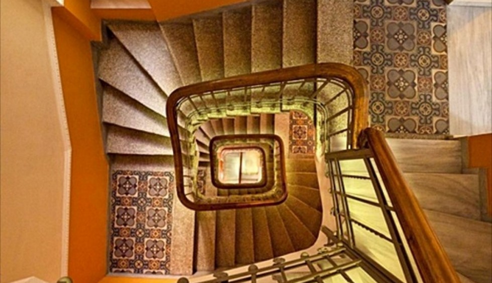 A generic square placeholder image with rounded corners in a figure.