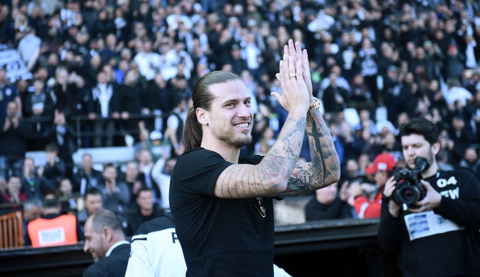 A generic square placeholder image with rounded corners in a figure.