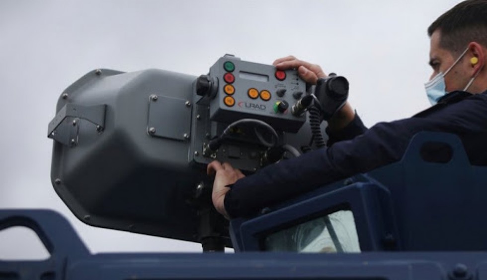 A generic square placeholder image with rounded corners in a figure.