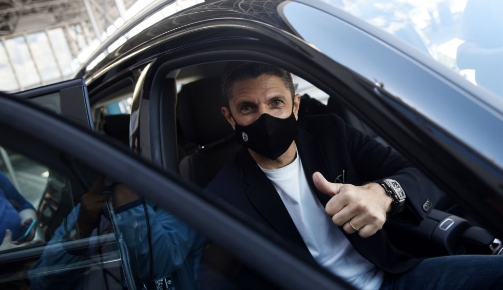 A generic square placeholder image with rounded corners in a figure.