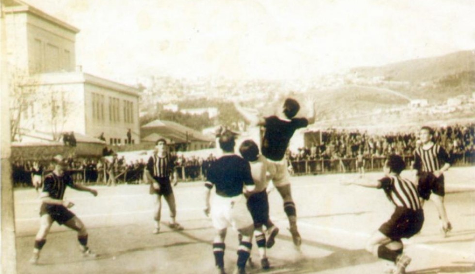 A generic square placeholder image with rounded corners in a figure.