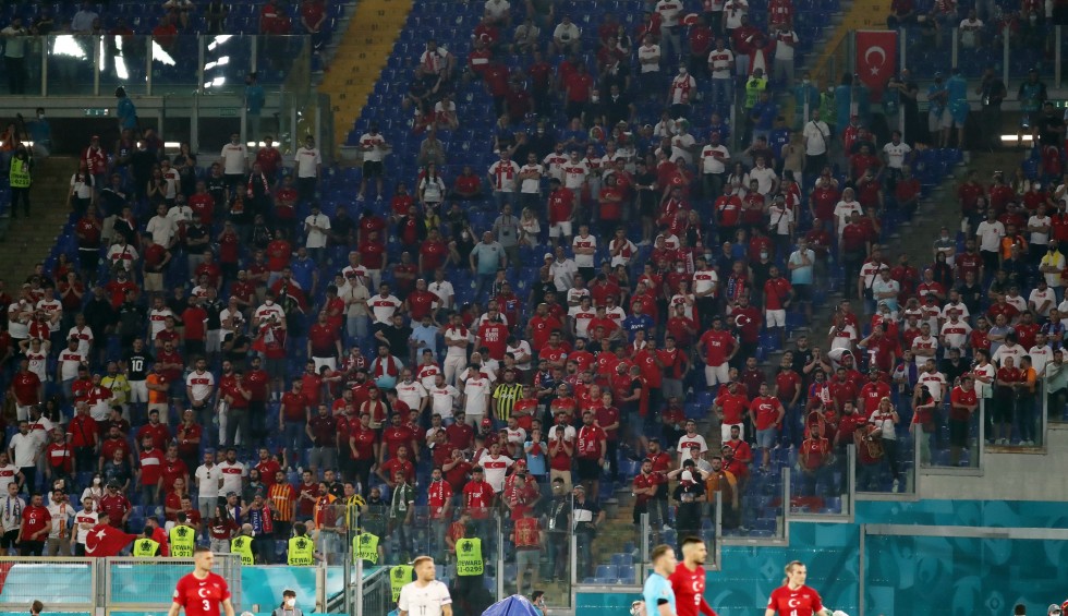 A generic square placeholder image with rounded corners in a figure.