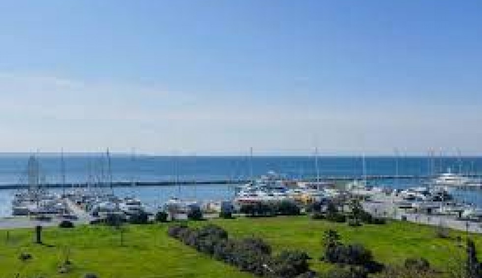 A generic square placeholder image with rounded corners in a figure.