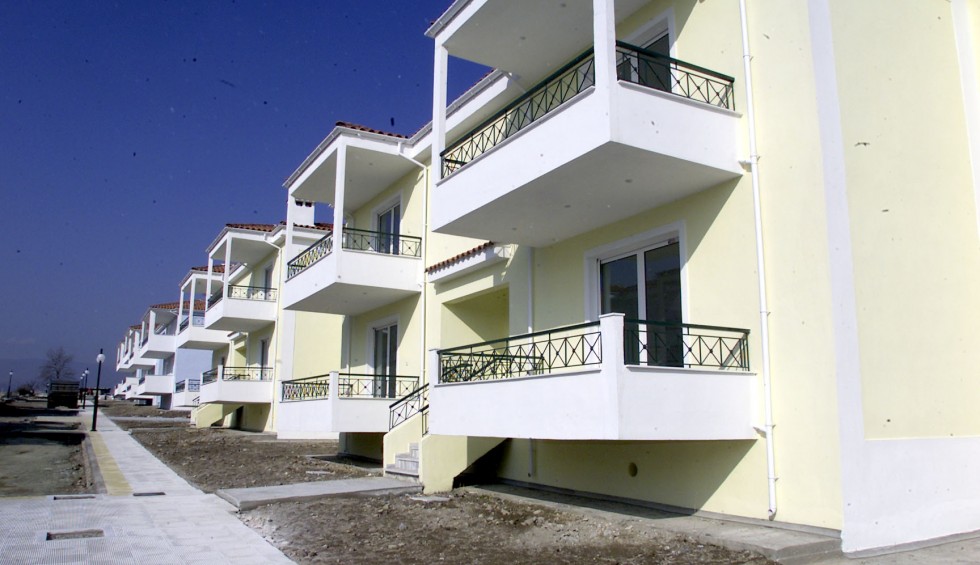 A generic square placeholder image with rounded corners in a figure.