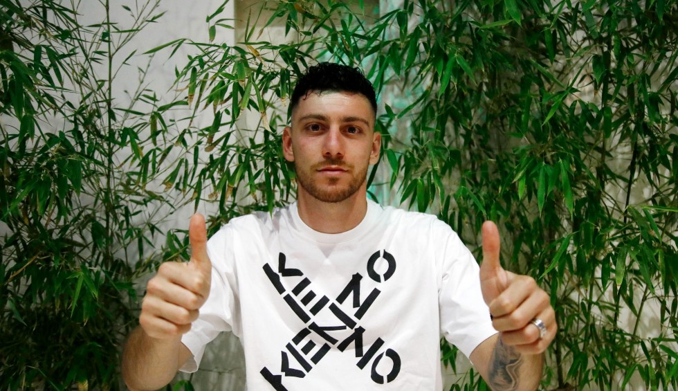 A generic square placeholder image with rounded corners in a figure.