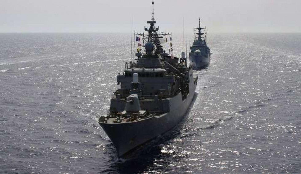 A generic square placeholder image with rounded corners in a figure.