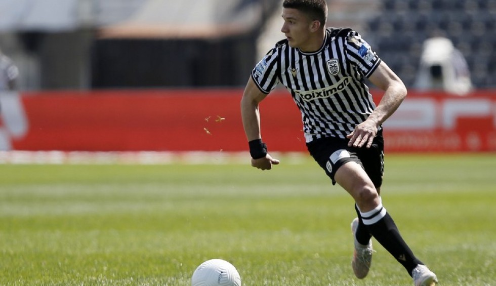 A generic square placeholder image with rounded corners in a figure.