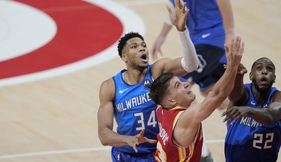 A generic square placeholder image with rounded corners in a figure.