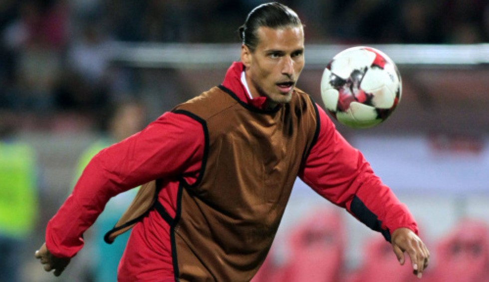 A generic square placeholder image with rounded corners in a figure.