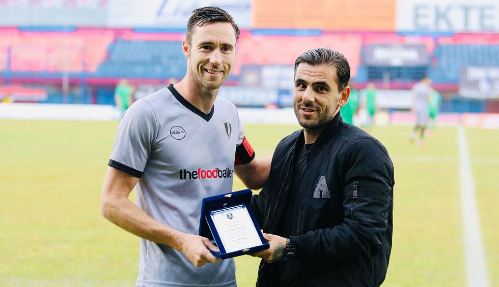 A generic square placeholder image with rounded corners in a figure.