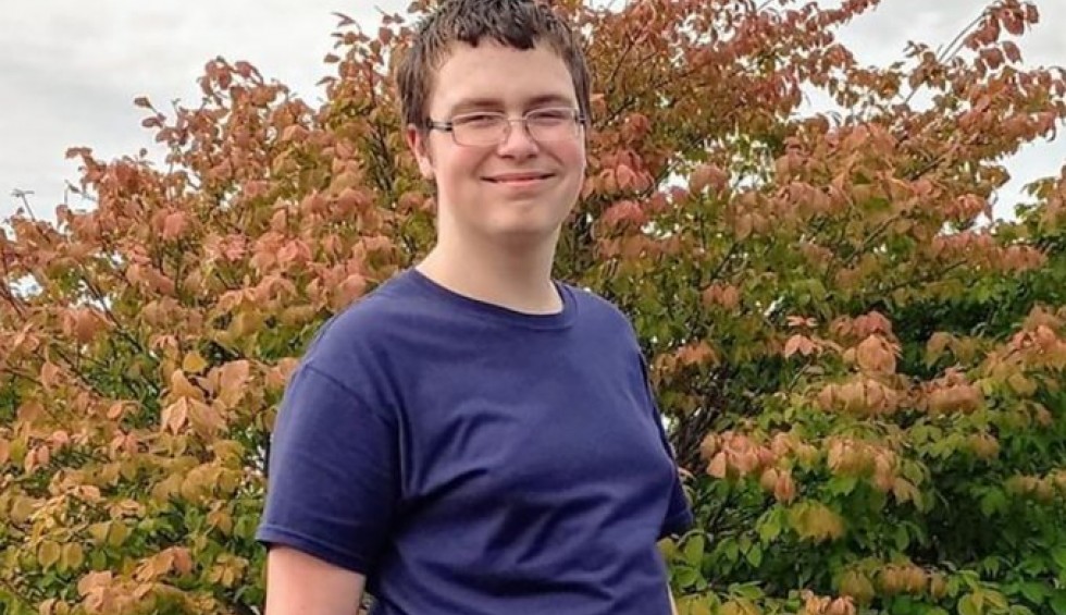 A generic square placeholder image with rounded corners in a figure.