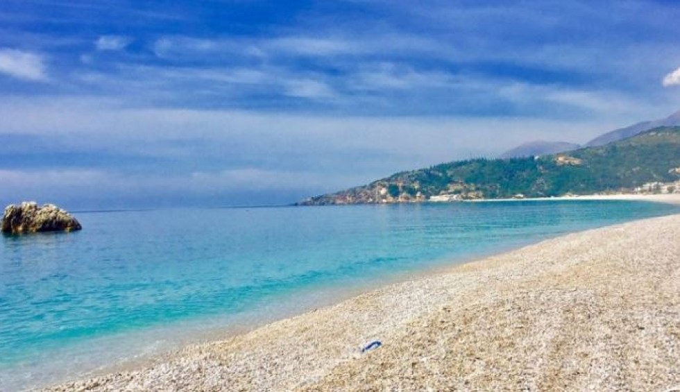 A generic square placeholder image with rounded corners in a figure.