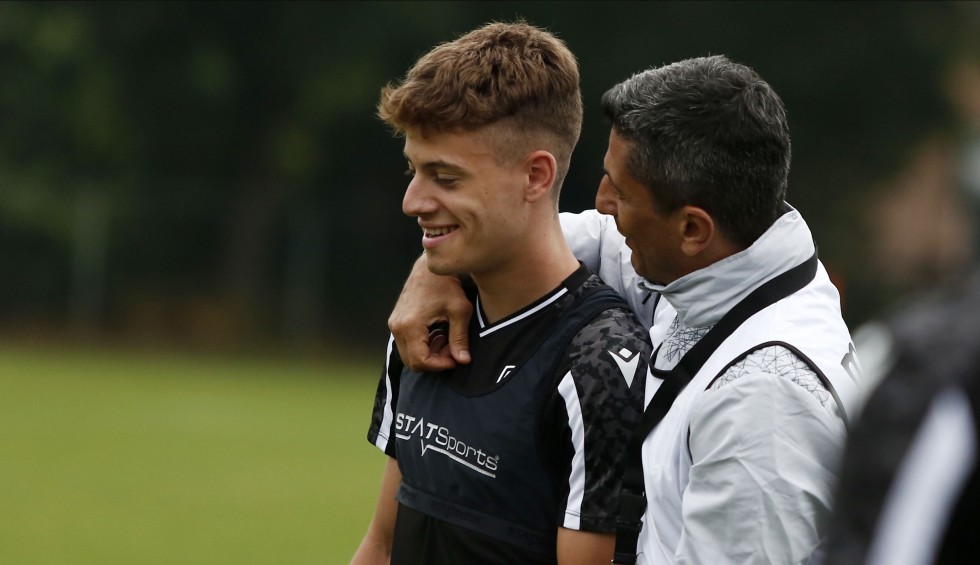 A generic square placeholder image with rounded corners in a figure.