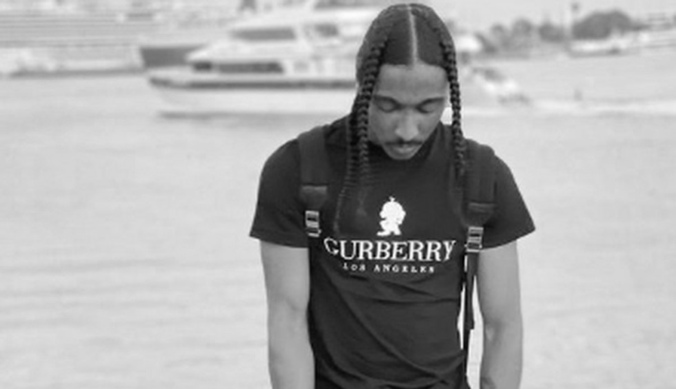 A generic square placeholder image with rounded corners in a figure.