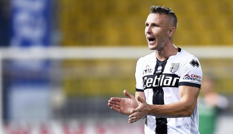 A generic square placeholder image with rounded corners in a figure.