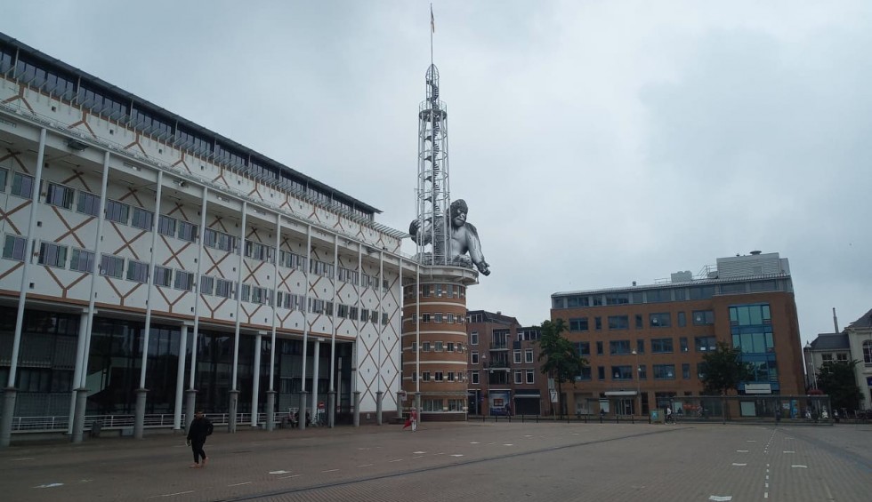 A generic square placeholder image with rounded corners in a figure.