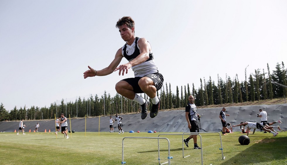 A generic square placeholder image with rounded corners in a figure.